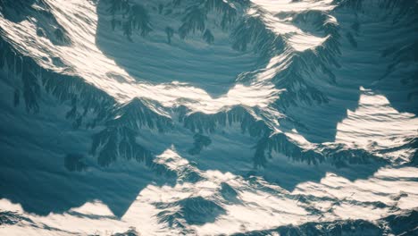 Vista-Aérea-De-Las-Montañas-De-Los-Alpes-En-La-Nieve